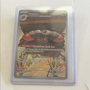 Crustle Trading Card with Mysterious Rock Inn Ability